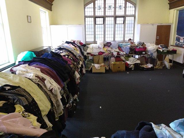 Ladies clothes, occupying two sides of this room